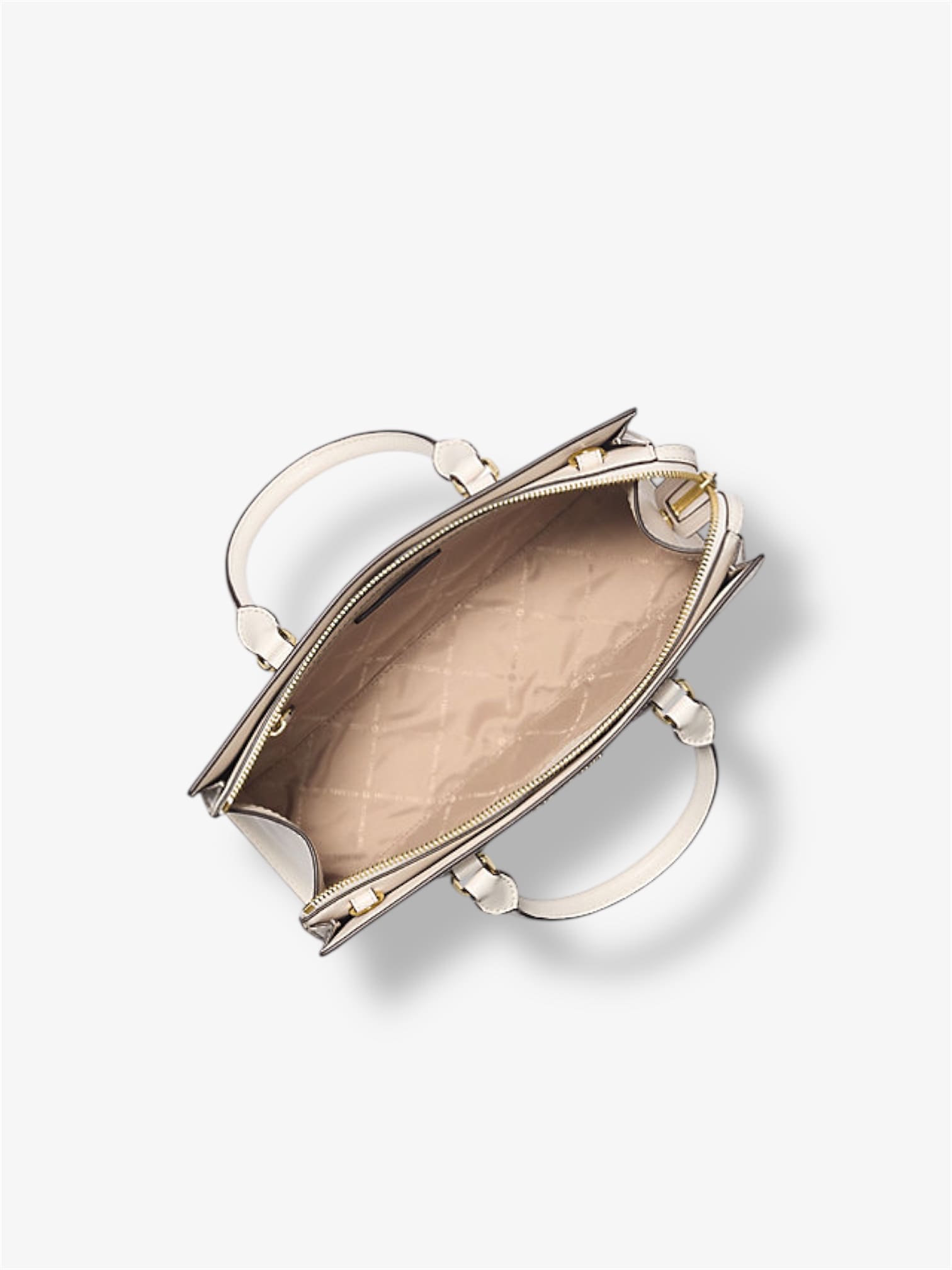 innenansicht-der-michael-kors-sheila-satchel-in-light-cream-mit-zwei-steckfaechern-und-reissverschlussfach