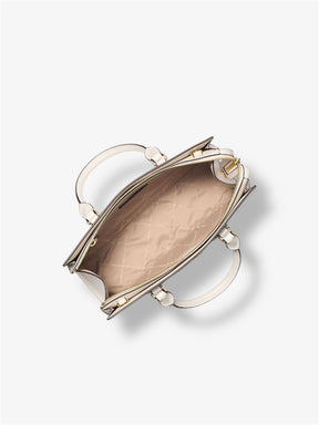 innenansicht-der-michael-kors-sheila-satchel-in-light-cream-mit-zwei-steckfaechern-und-reissverschlussfach